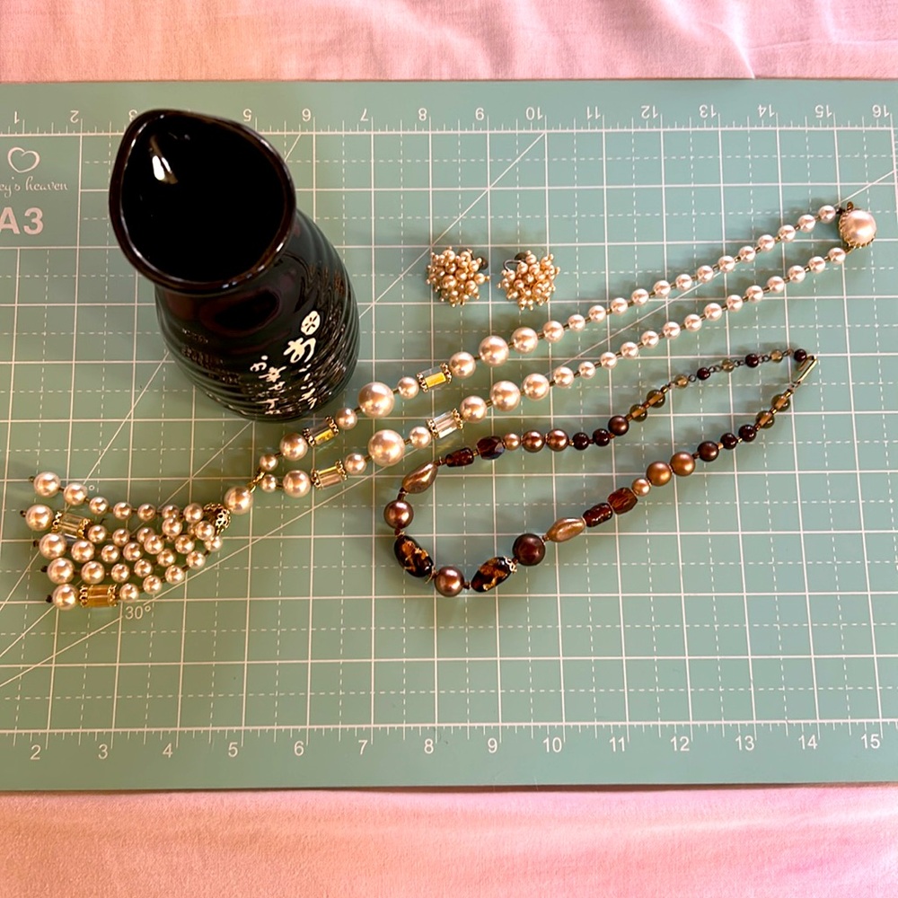 Saki bottle black with white letters and stamped vintage jewelry